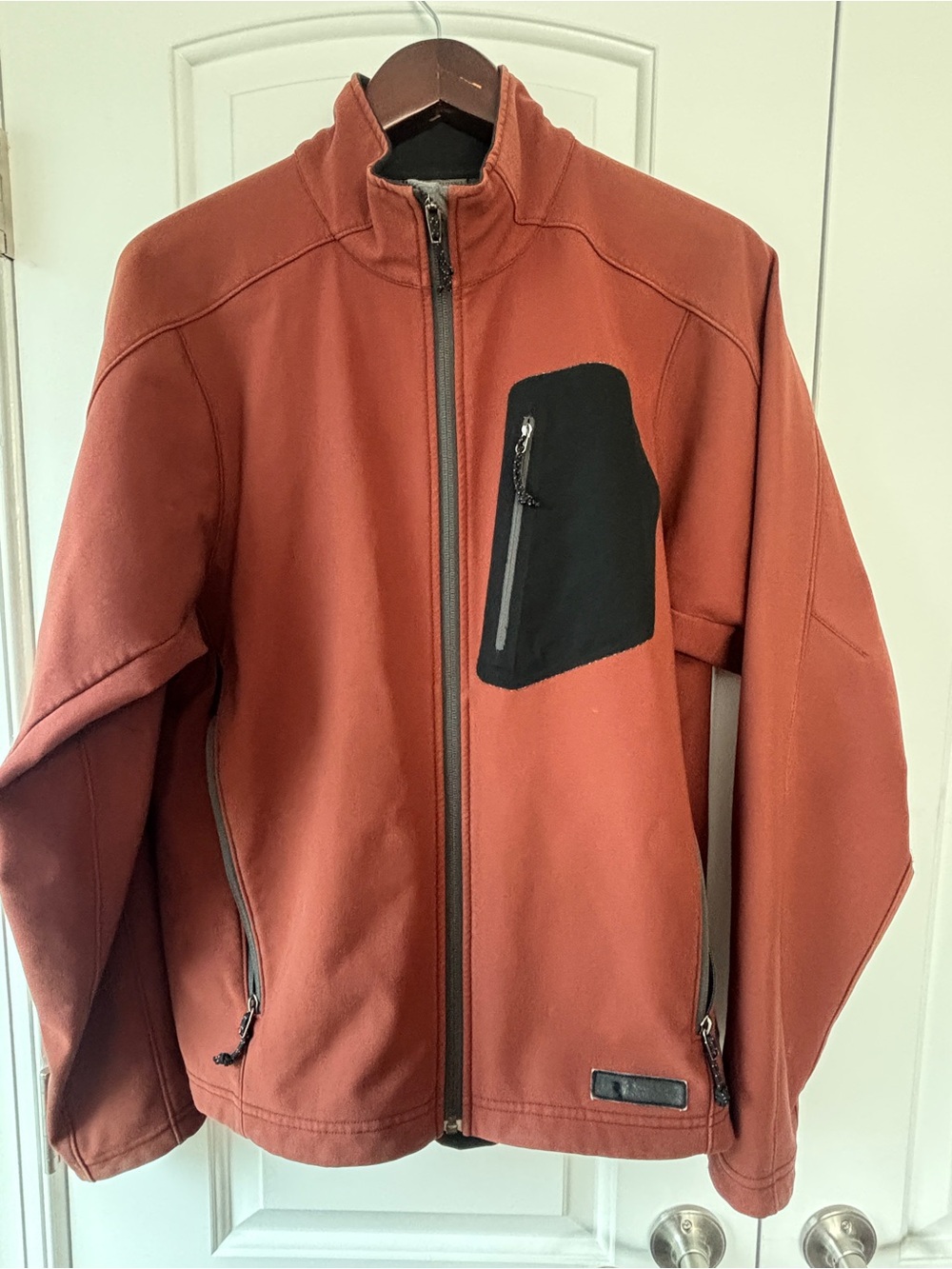 REI Rust Softshell Jacket with Black Chest Pocket